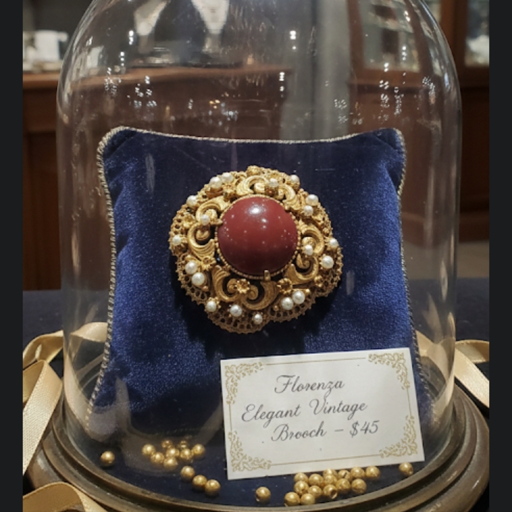 Elegant Gold And Red Brooch With Pearls